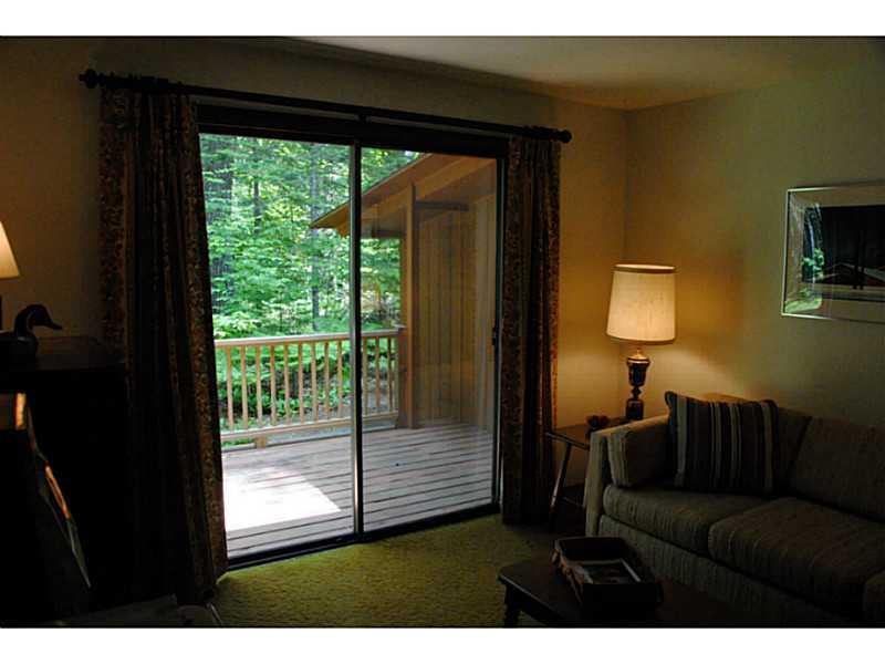 1019 Poplar Stream Road Carrabassett Valley, ME 04947 - Photo 16 of 35 Bedroom. This 1st floor bedroom has...