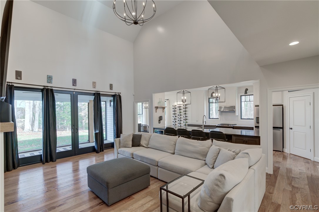 7097 Ware House Road Gloucester, VA 23061 - Photo 2 of 49 a living room with furniture and a large window