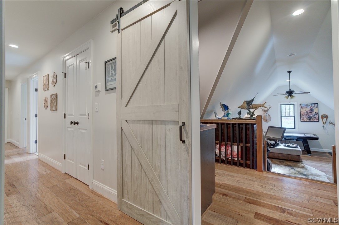 7097 Ware House Road Gloucester, VA 23061 - Photo 21 of 49 a view of entryway and hall with wooden floor