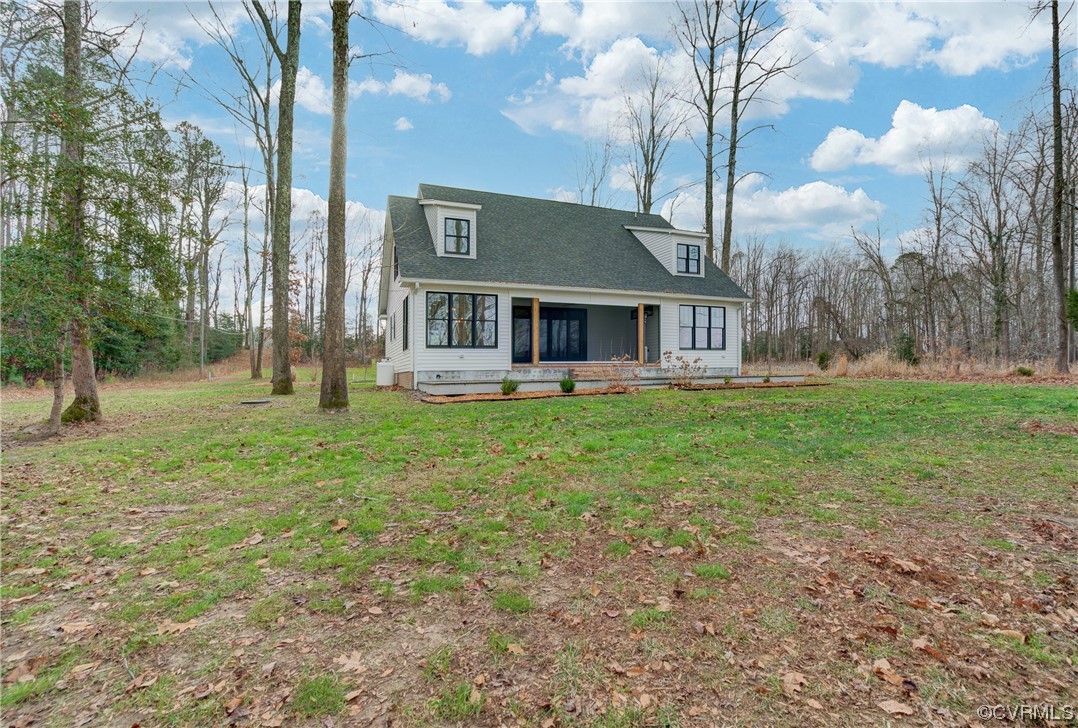 7097 Ware House Road Gloucester, VA 23061 - Photo 34 of 49 a view of a house with a yard
