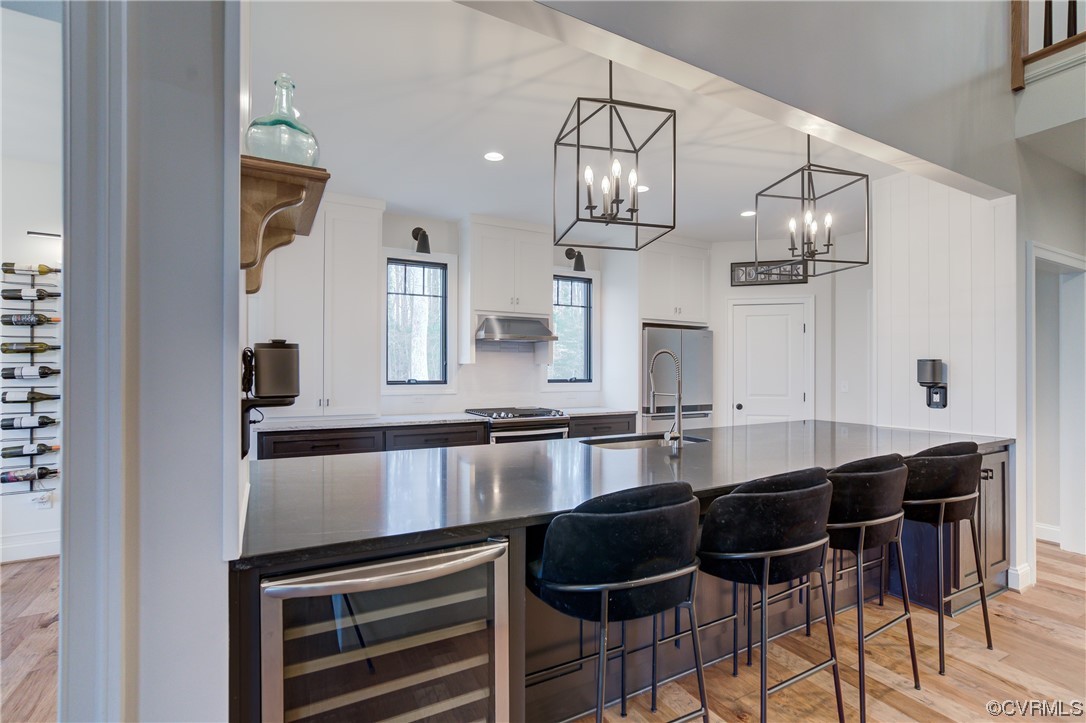 7097 Ware House Road Gloucester, VA 23061 - Photo 6 of 49 a kitchen with granite countertop a sink and stove