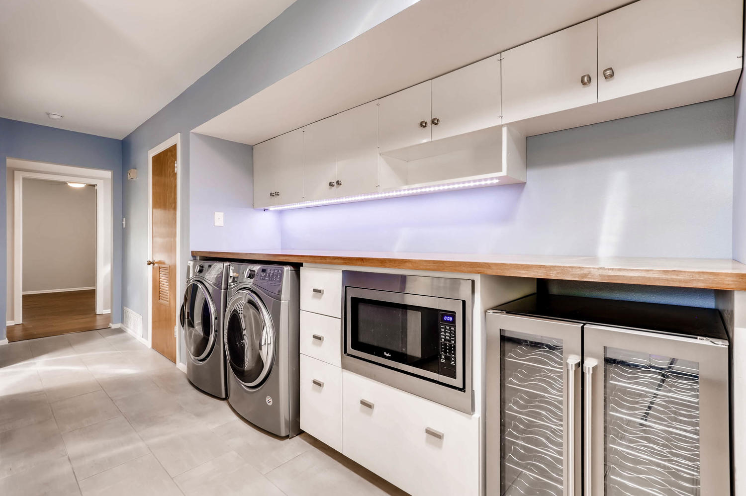 446 Pike Road San Antonio, TX 78209 - Photo 21 of 28 A well-appointed laundry area combines functionality with sleek modern design.
