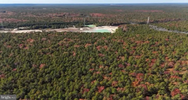 a picture of a bathroom with a sink and a shower curtain