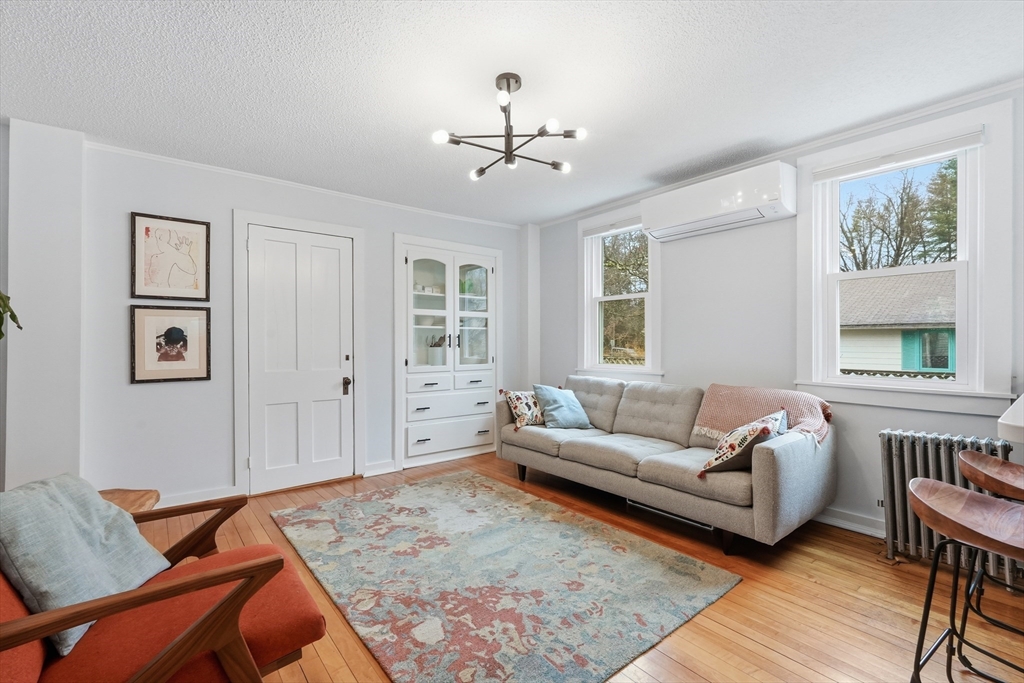 38 Front Street Northampton, MA 01053 - Photo 12 of 42 a living room with furniture and window