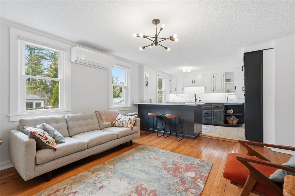 38 Front Street Northampton, MA 01053 - Photo 13 of 42 a living room with furniture and kitchen view