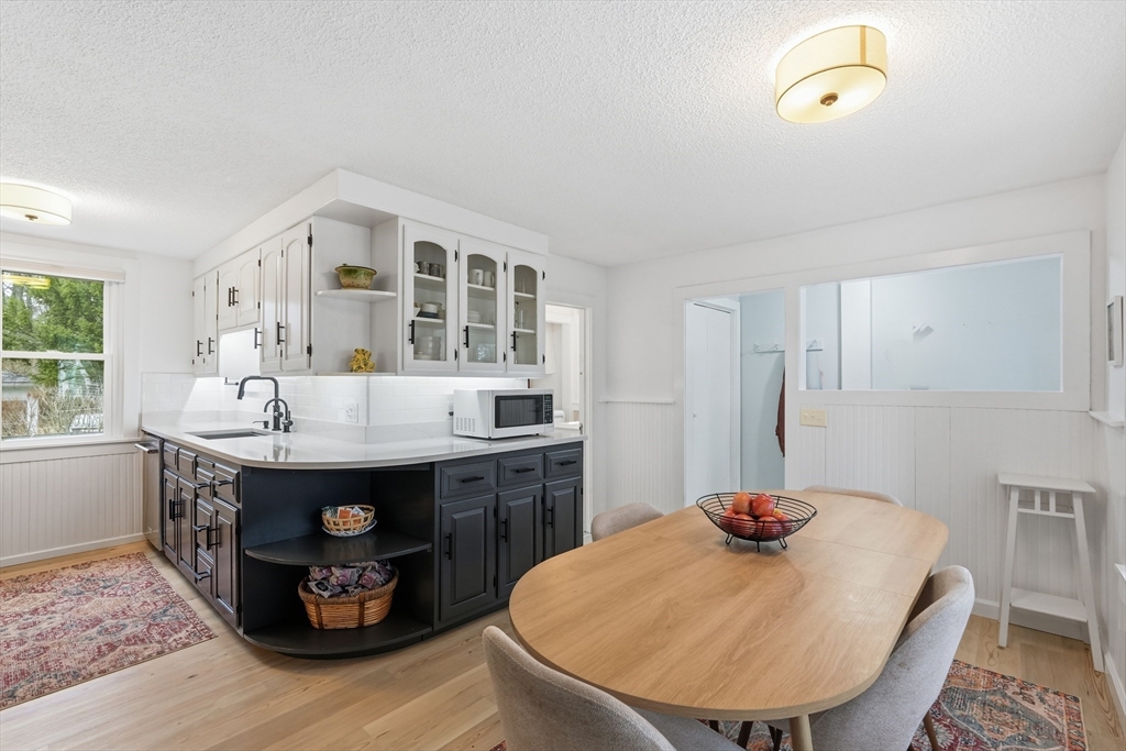 38 Front Street Northampton, MA 01053 - Photo 17 of 42 a kitchen with a table and chairs