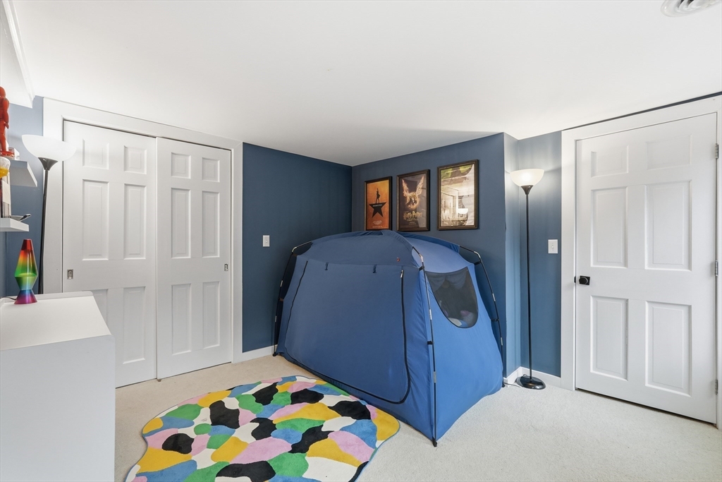 38 Front Street Northampton, MA 01053 - Photo 29 of 42 a bedroom with a bed and a cabinets