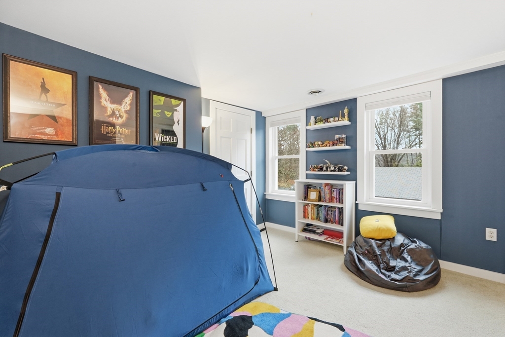 38 Front Street Northampton, MA 01053 - Photo 30 of 42 a bedroom with a bed and a large window