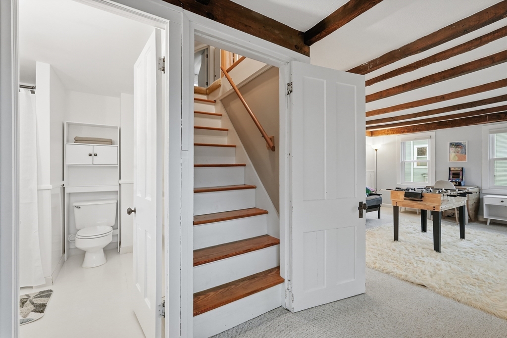 38 Front Street Northampton, MA 01053 - Photo 34 of 42 a view of a bedroom with wooden floor and furniture