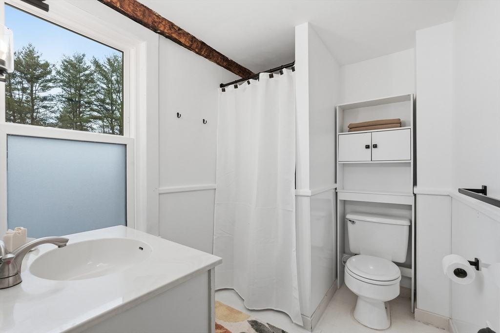 38 Front Street Northampton, MA 01053 - Photo 35 of 42 a bathroom with a sink toilet and shower