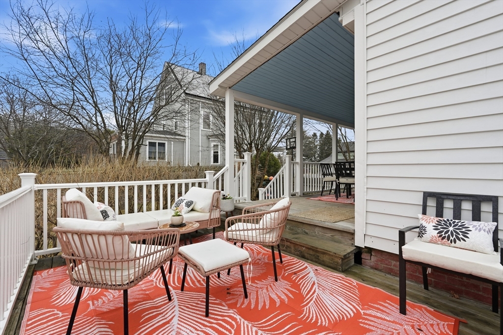 38 Front Street Northampton, MA 01053 - Photo 38 of 42 a view of a chair and tables in the balcony