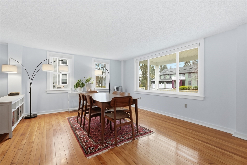 38 Front Street Northampton, MA 01053 - Photo 6 of 42 a living room with furniture and a wooden floor