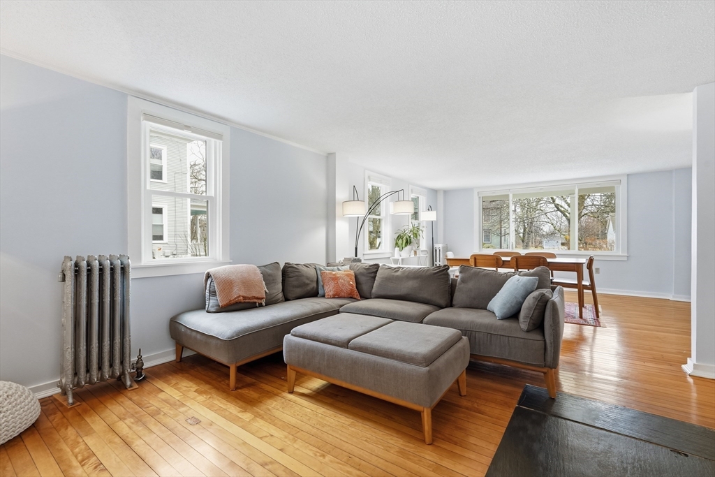 38 Front Street Northampton, MA 01053 - Photo 8 of 42 a living room with furniture and a window