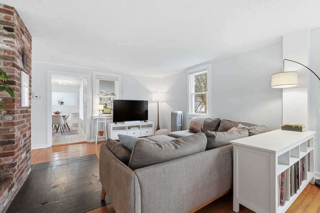 38 Front Street Northampton, MA 01053 - Photo 9 of 42 a living room with furniture and a flat screen tv