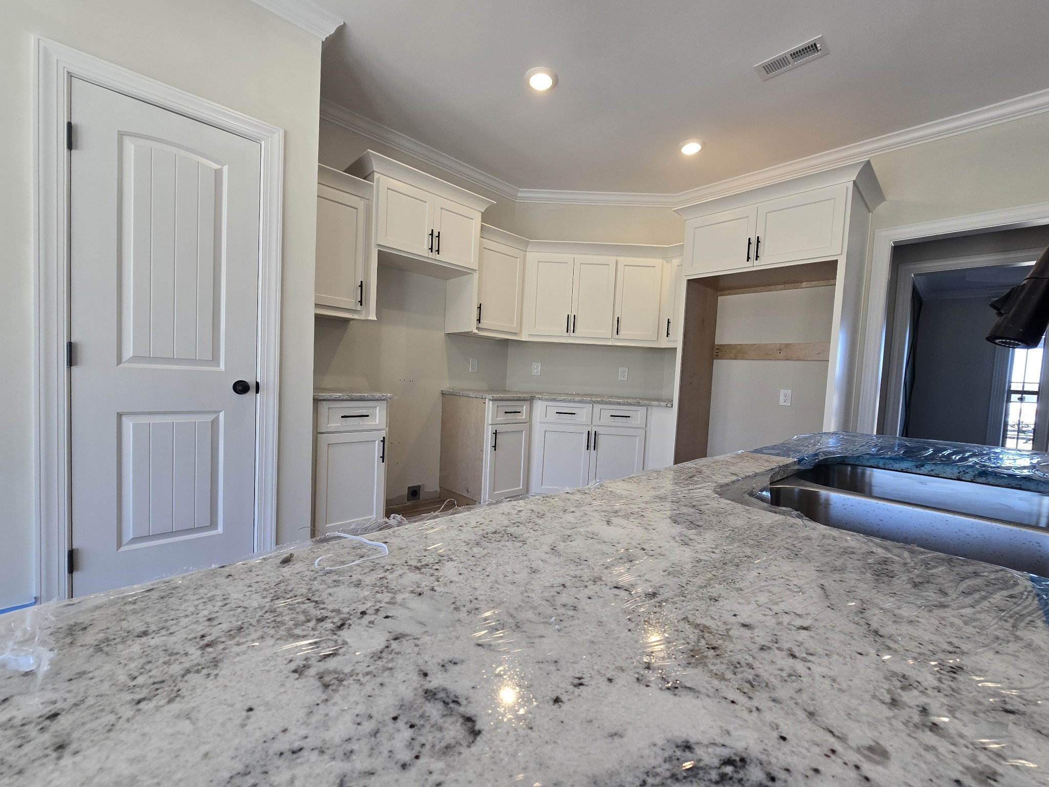 116 Dandelion Lane Beechgrove, TN 37018 - Photo 14 of 31 a kitchen with stainless steel appliances granite countertop a refrigerator and a sink