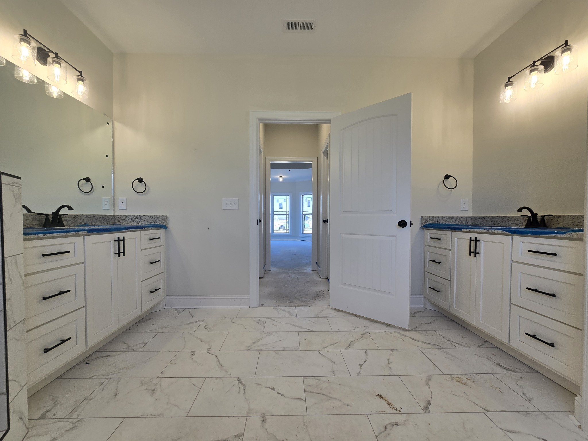 116 Dandelion Lane Beechgrove, TN 37018 - Photo 20 of 31 a spacious bathroom with a granite countertop sink a mirror and a