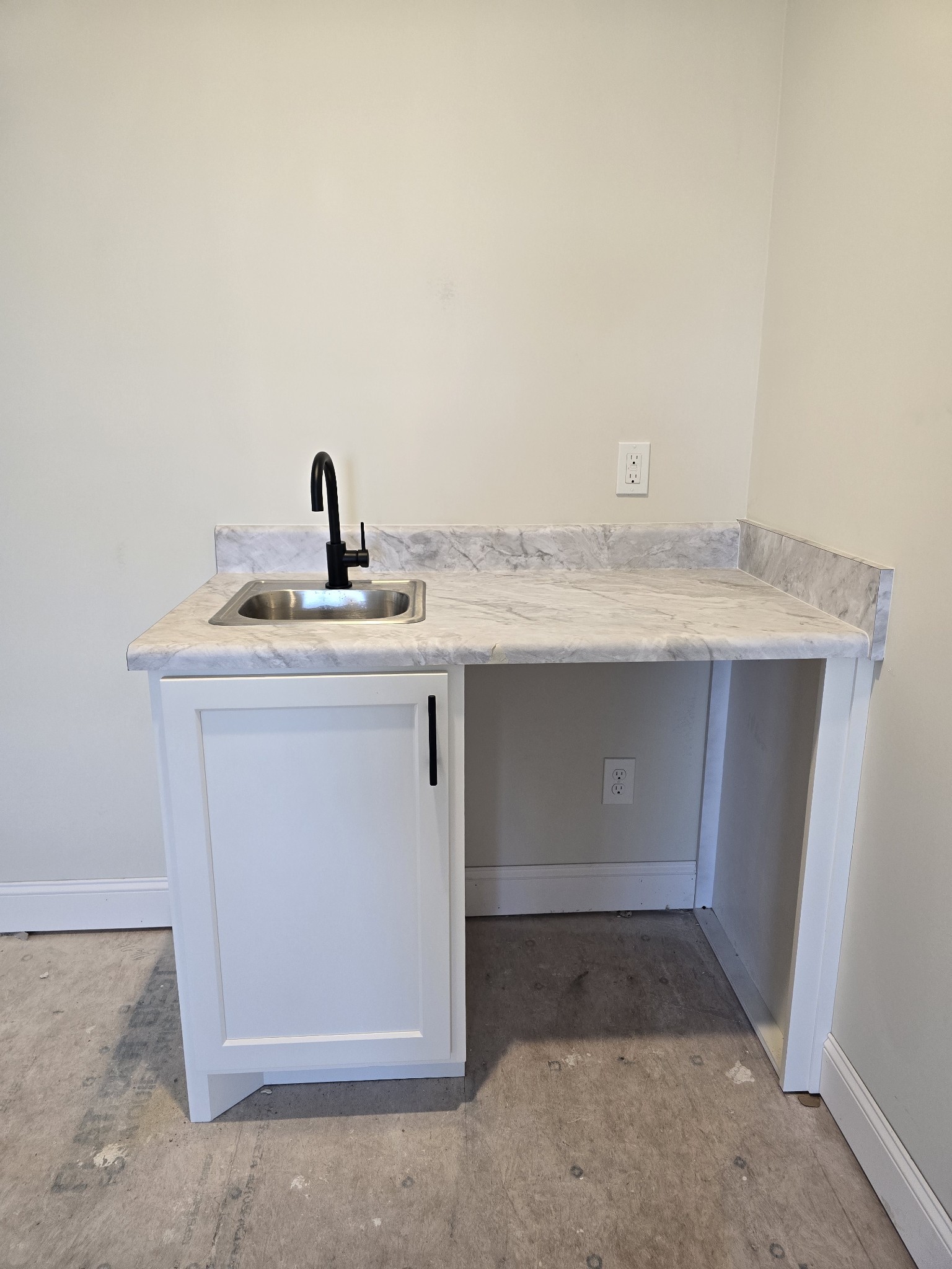 116 Dandelion Lane Beechgrove, TN 37018 - Photo 27 of 31 a kitchen with a sink and cabinets