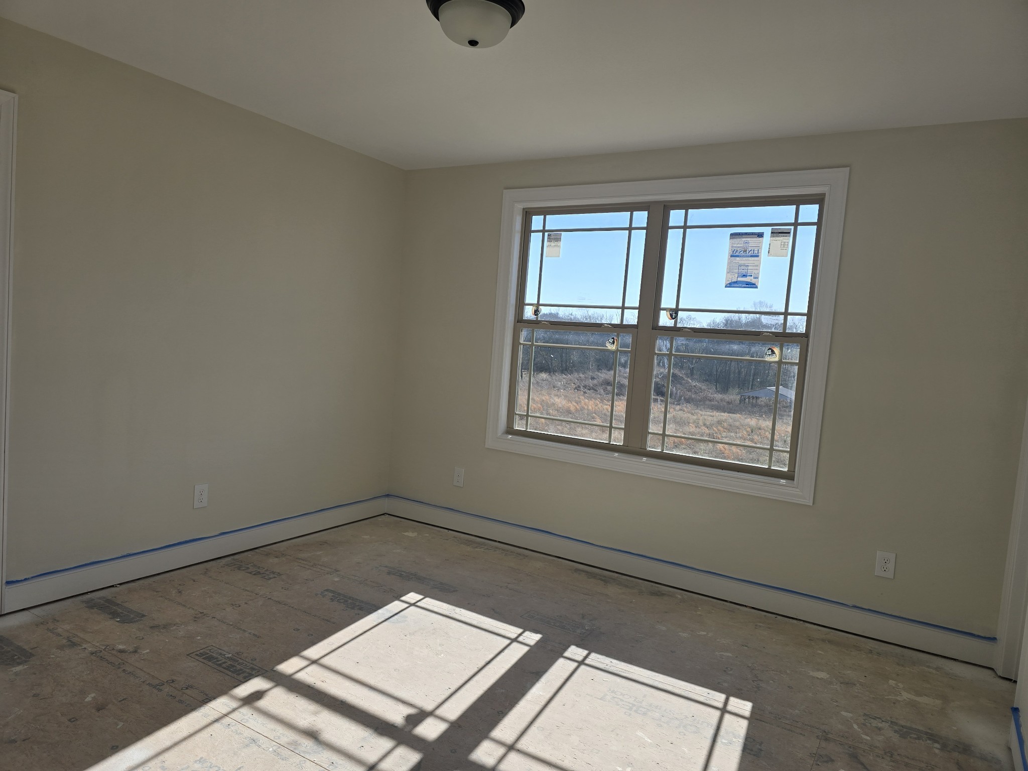 116 Dandelion Lane Beechgrove, TN 37018 - Photo 29 of 31 an empty room with windows