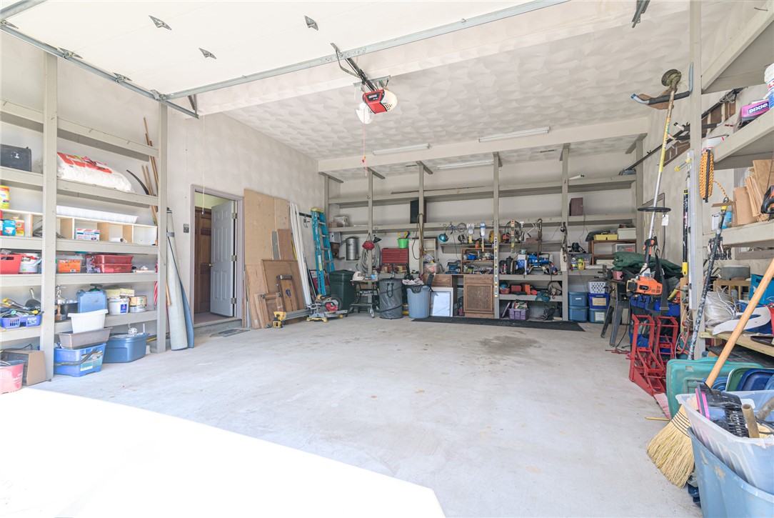 31 Kingfisher Road South Kingstown, RI 02879 - Photo 16 of 24 2 car garage. Door to home and another door to side yard