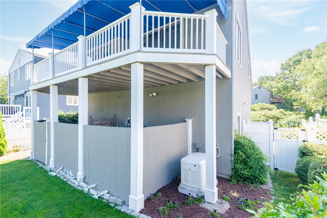 31 Kingfisher Road South Kingstown, RI 02879 - Photo 19 of 24 Generator. Propane tanks for generator under deck