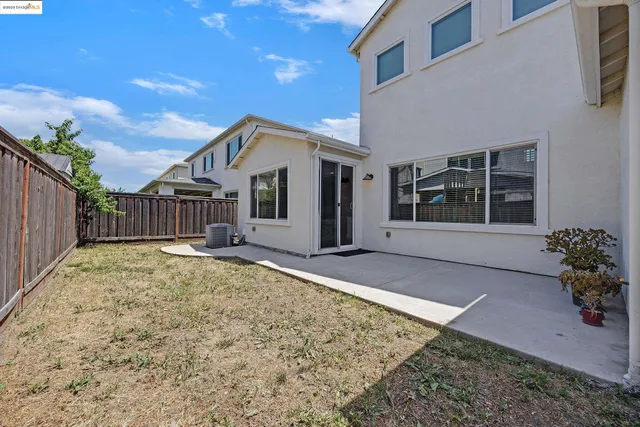 a house with trees in the background