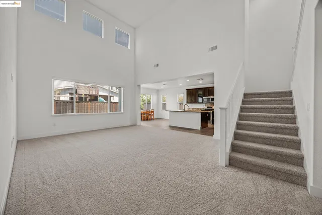 a view of empty room with a fireplace