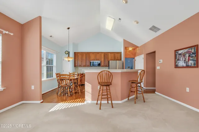 a view of a dining room with furniture
