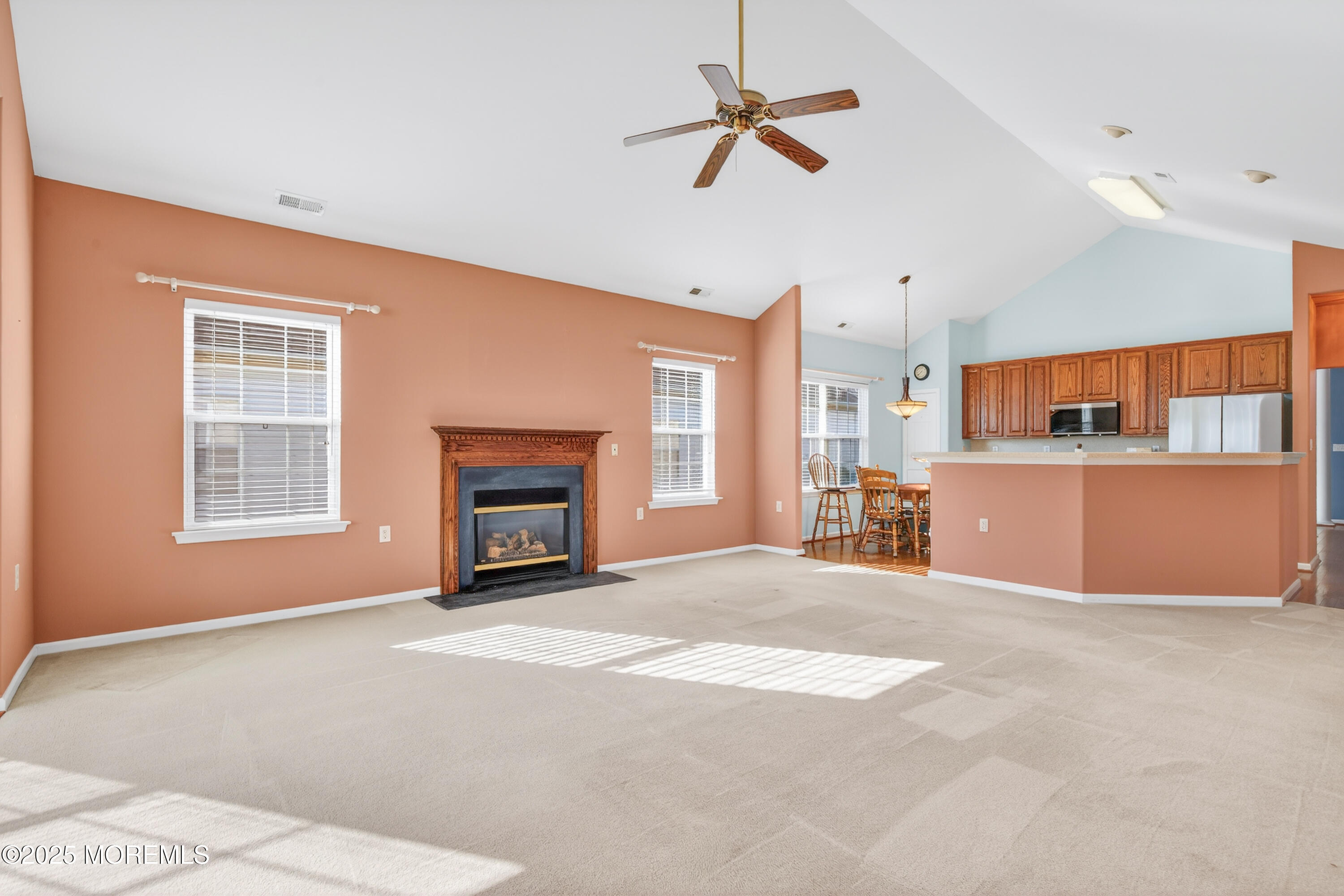 11 Drayton Road Manchester Township, NJ 08759 - Photo 15 of 39 a view of an empty room with a fireplace and a window