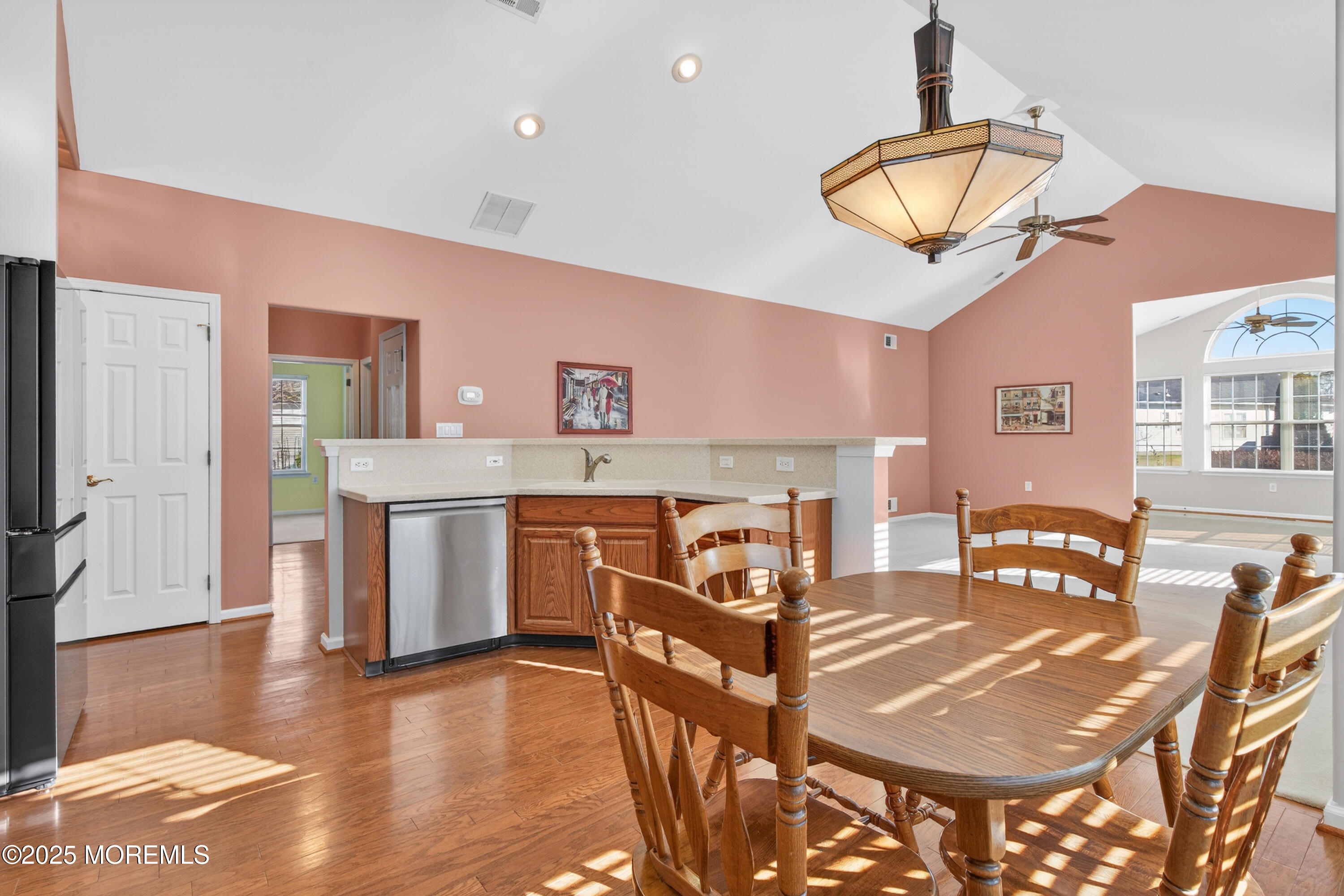 11 Drayton Road Manchester Township, NJ 08759 - Photo 10 of 39 a view of a dining room with furniture and wooden floor