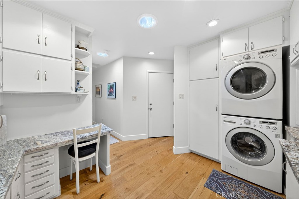 4872 N Arcade Fresno, CA 93704 - Photo 23 of 75 a view of a kitchen with washer and dryer