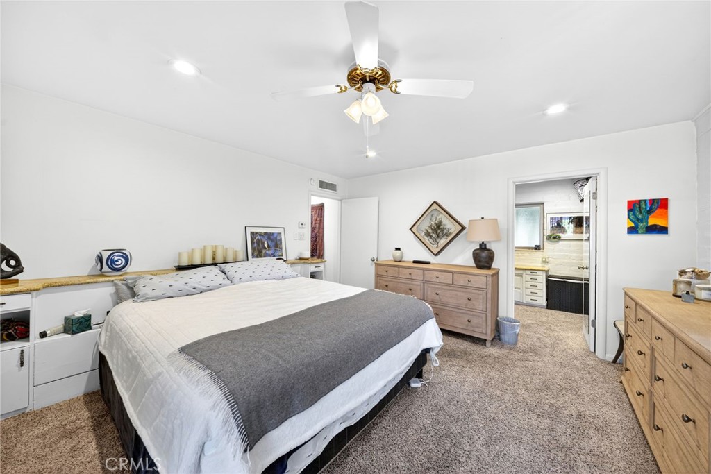 4872 N Arcade Fresno, CA 93704 - Photo 38 of 75 a bedroom with a bed dresser and a dresser