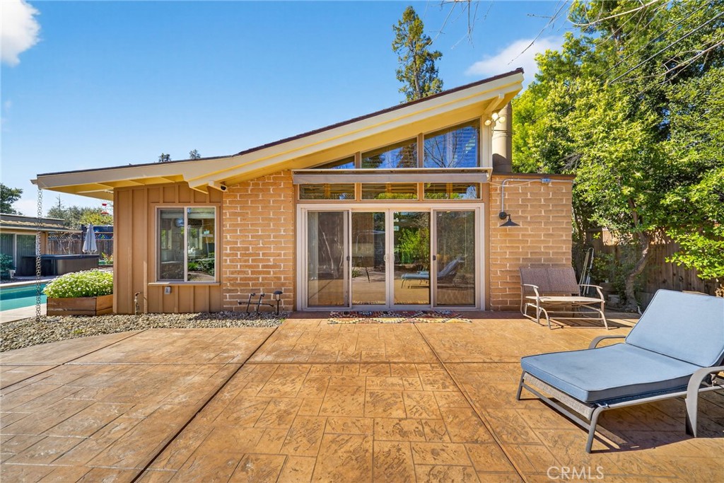 4872 N Arcade Fresno, CA 93704 - Photo 43 of 75 a front view of house with outdoor seating and barbeque oven