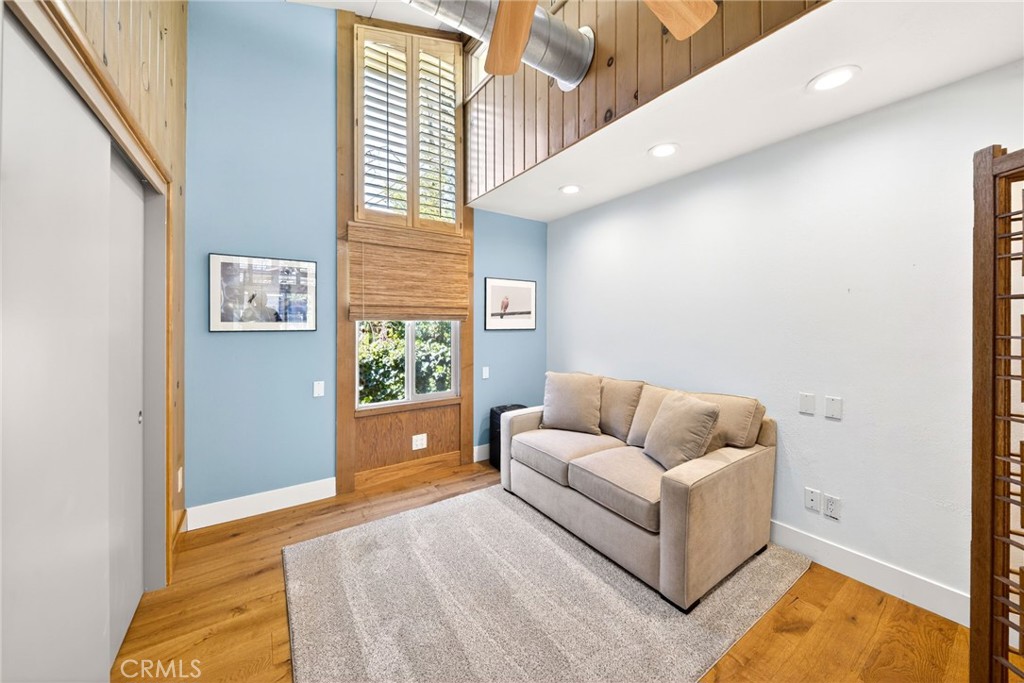 4872 N Arcade Fresno, CA 93704 - Photo 53 of 75 a living room with furniture and a rug