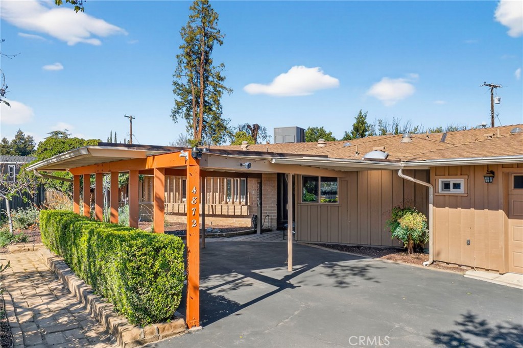 4872 N Arcade Fresno, CA 93704 - Photo 6 of 75 a view of a white house with a yard and potted plants