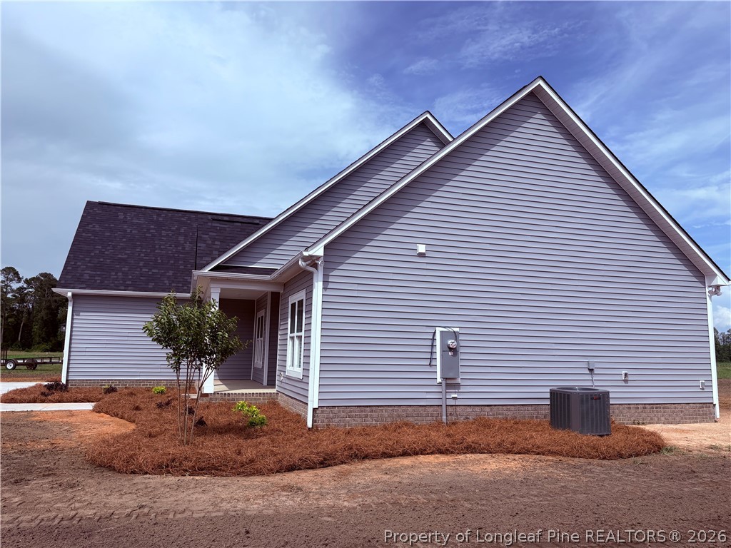 1075 Purdie-Hall Road Tar Heel, NC 28392 - Photo 24 of 28 a front view of a house with garage