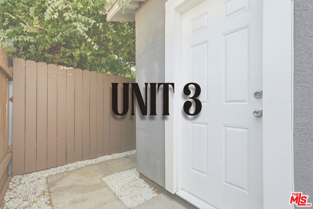 18149 Welby Way Reseda, CA 91335 - Photo 30 of 50 a view of entryway and hall with wooden floor