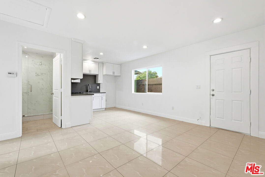 18149 Welby Way Reseda, CA 91335 - Photo 31 of 50 a view of a kitchen with electric appliances