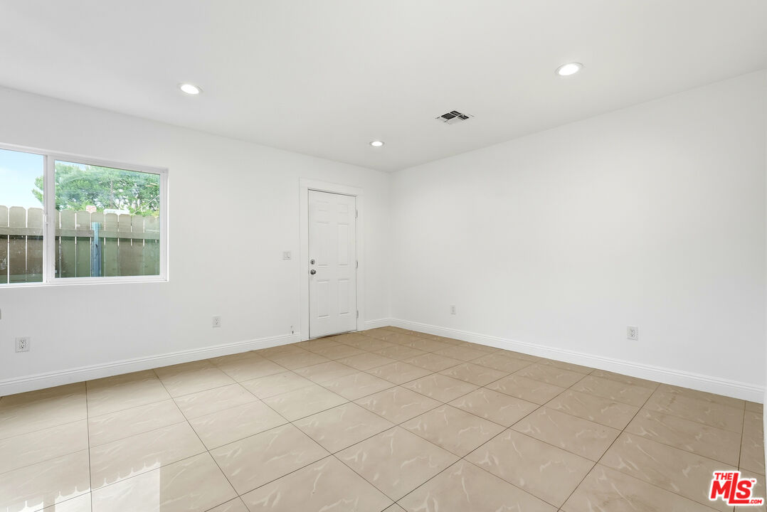 18149 Welby Way Reseda, CA 91335 - Photo 39 of 50 an empty room with a window