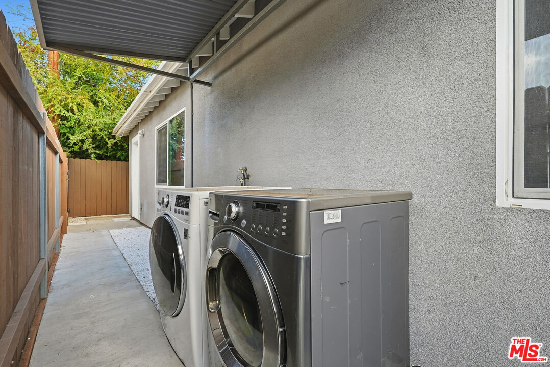 18149 Welby Way Reseda, CA 91335 - Photo 46 of 50 a utility room with dryer and washer