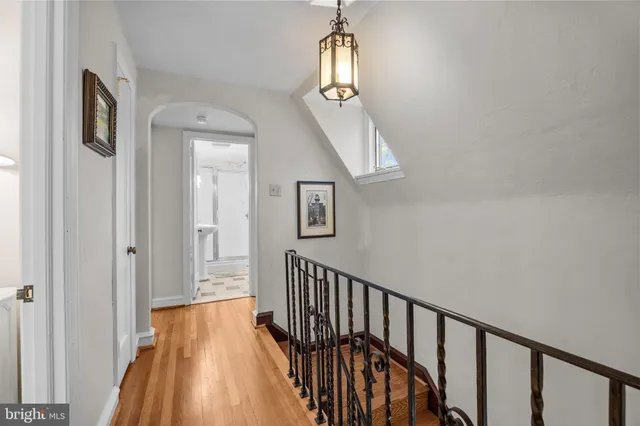 a bathroom with a shower and a sink