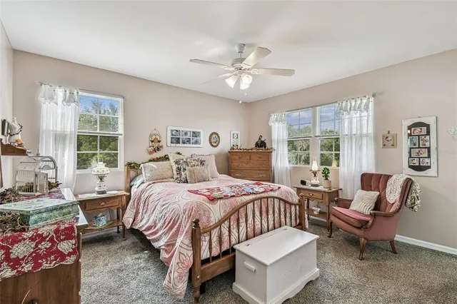 a view of a livingroom with workspace and a couch