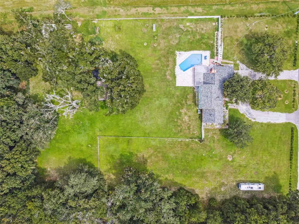 33937 St Benedict Road San Antonio, FL 33576 - Photo 4 of 58 an aerial view of a residential houses with outdoor space