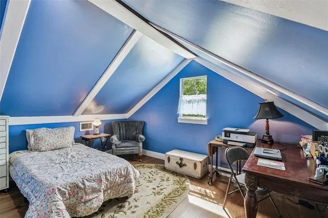 a view of house with a yard