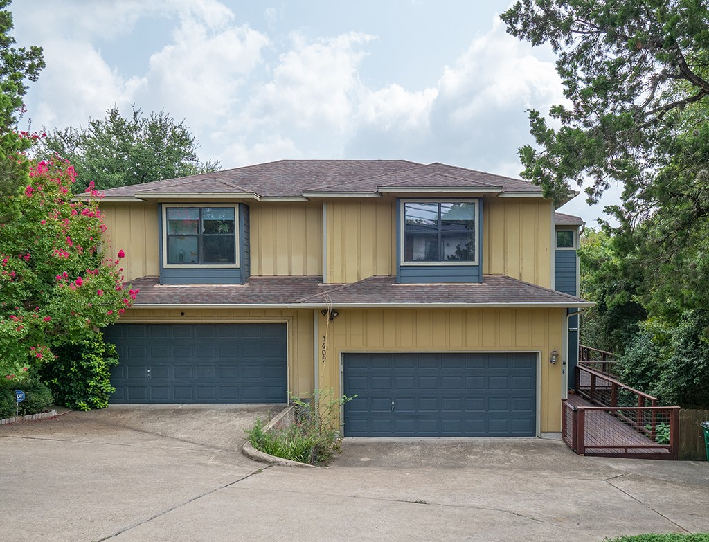 3609 Clawson Road, Unit B Austin, TX 78704 - Photo 3 of 28 Multi-level exterior with yellow siding and contrasting blue trim