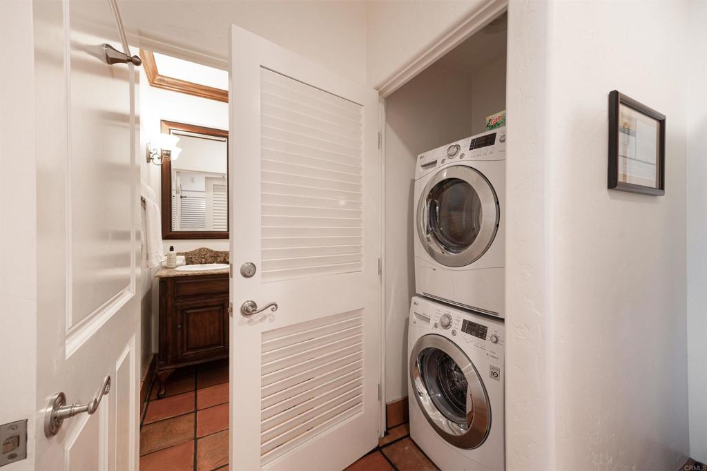 7310 Estrella De Mar Road, Unit 6 Carlsbad, CA 92009 - Photo 14 of 46 a utility room with sink dryer and washer