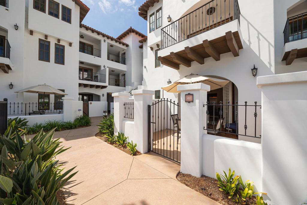 7310 Estrella De Mar Road, Unit 6 Carlsbad, CA 92009 - Photo 2 of 46 a view of a building with a outdoor space
