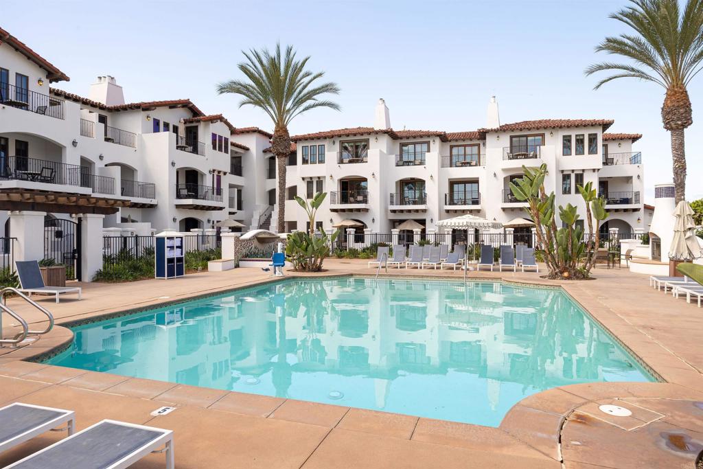 7310 Estrella De Mar Road, Unit 6 Carlsbad, CA 92009 - Photo 3 of 46 a view of building with yard