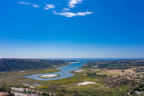 a view of a lake with a city