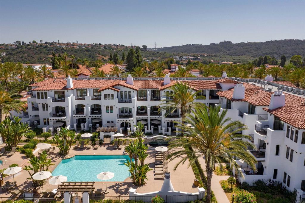 7310 Estrella De Mar Road, Unit 6 Carlsbad, CA 92009 - Photo 34 of 46 a view of a lake with a city