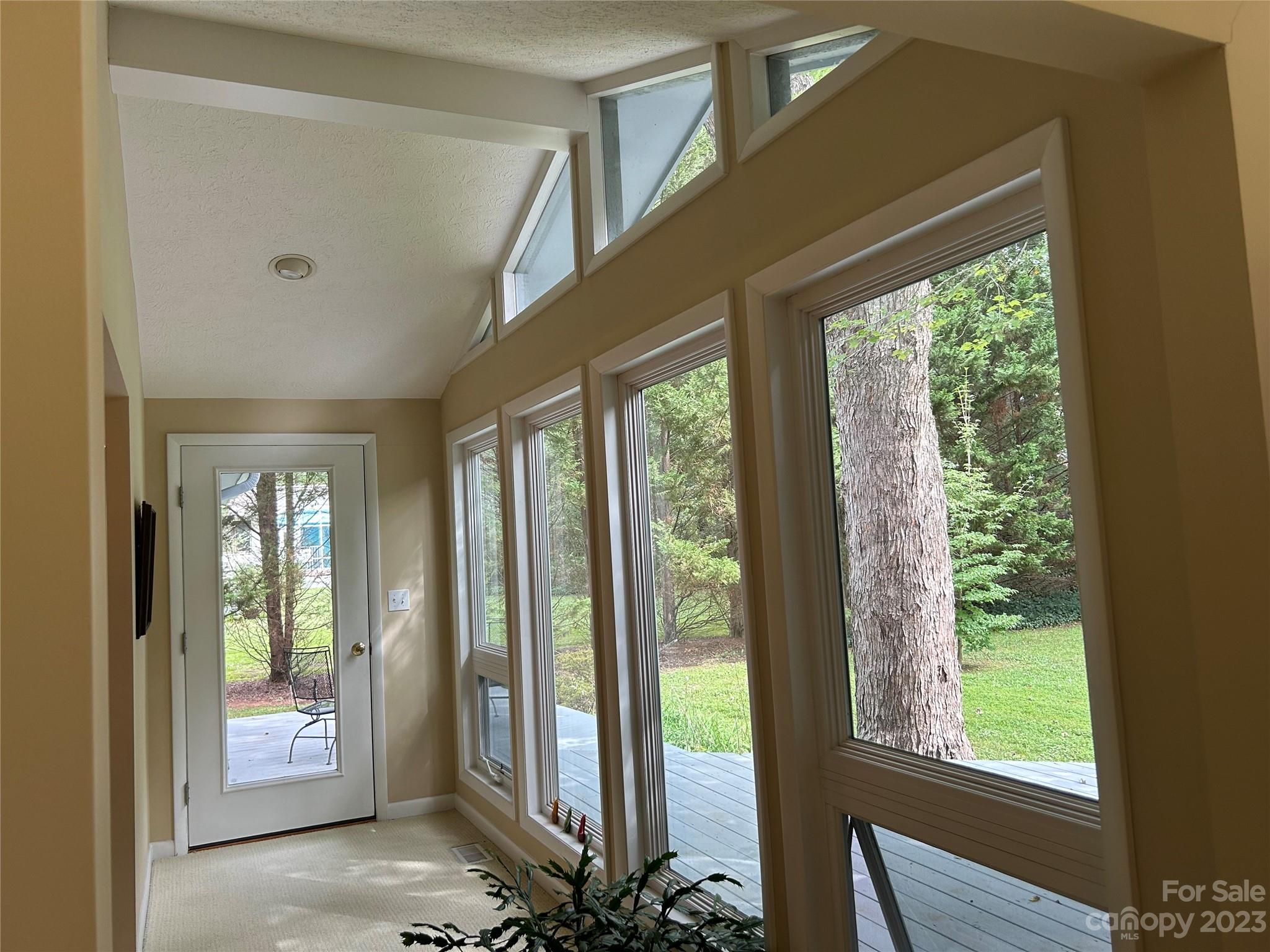 428 Brandon Road Hendersonville, NC 28739 - Photo 11 of 48 a view of an entryway with a floor to ceiling window